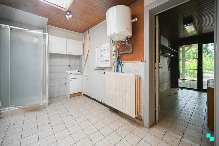Te renoveren handelshuis nabij het centrum van Lauwe