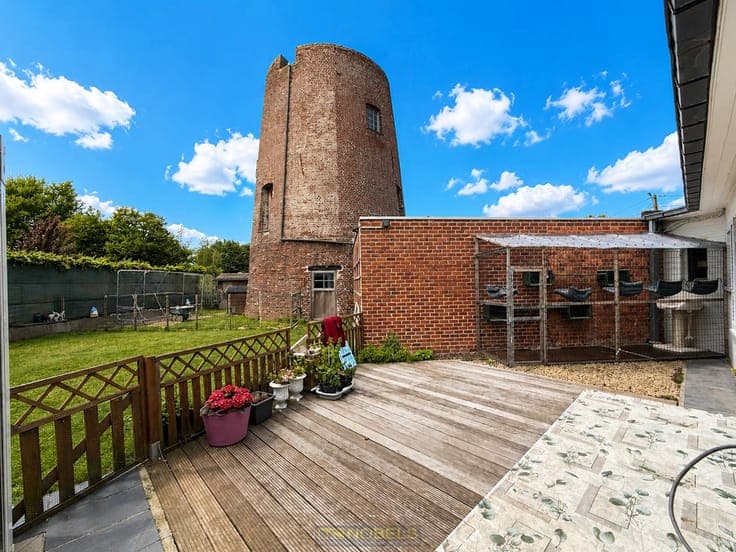 Te koop, te moderniseren woning met molen te Huise (Kruisem)