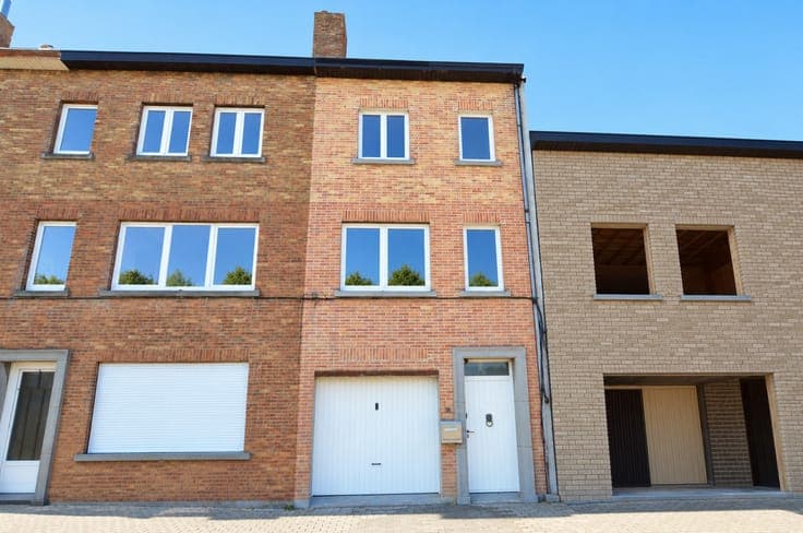 Ruime woning met stadstuin, terras, garage, 3 slaapkamers...