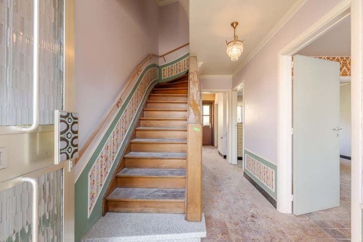 Kloeke woning met 3 slaapkamers en tuin/ bouwgrond TE KOO...