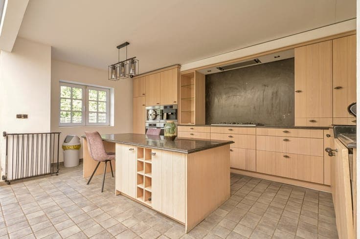 Woning met 3 slaapkamers en polyvalente voorruimte.
