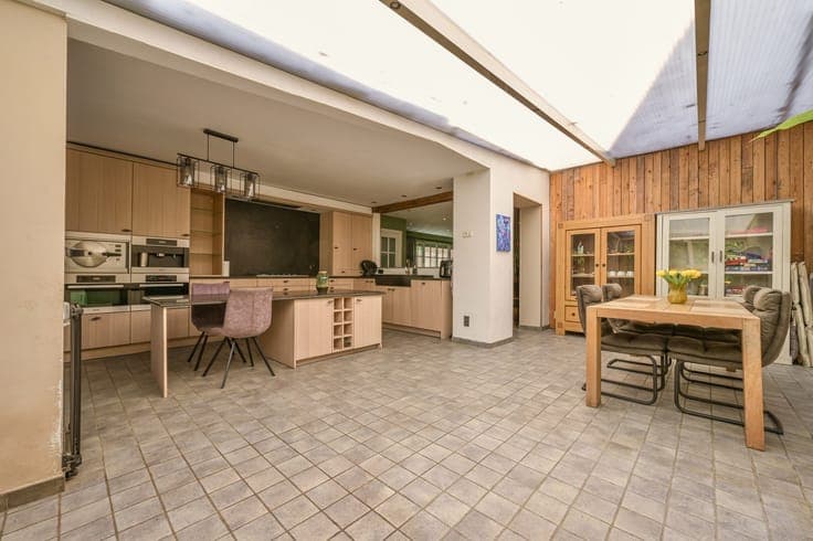 Woning met 3 slaapkamers en polyvalente voorruimte.