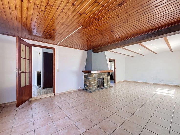 Maison 2 chambres + bureau avec garage et jardin