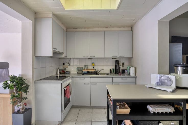 Family home with rear access and parking.