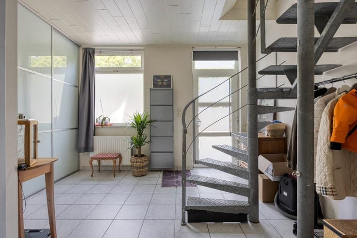 Family home with rear access and parking.