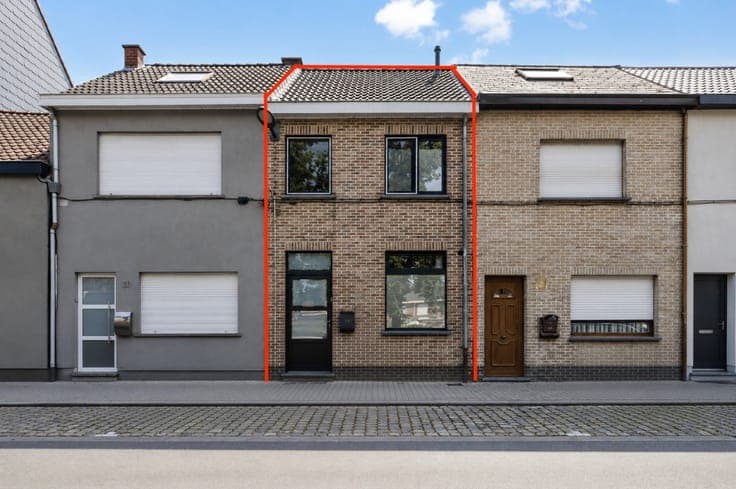 Family home with rear access and parking.