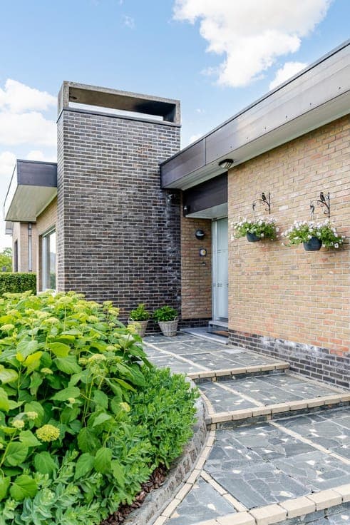Rustig gelegen, ruime woning met gigantische tuin