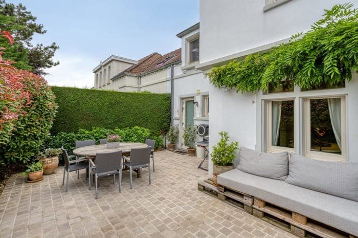 a charming semi-detached house with three bedrooms