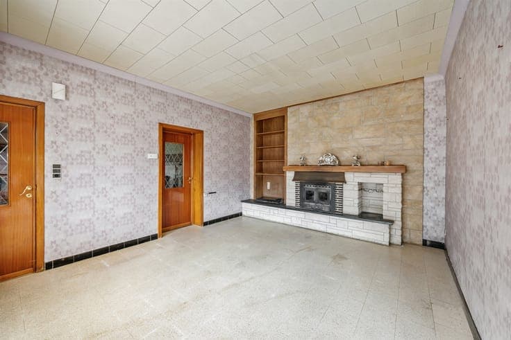 Spacious home in need of renovation with 4 bedrooms and a ga