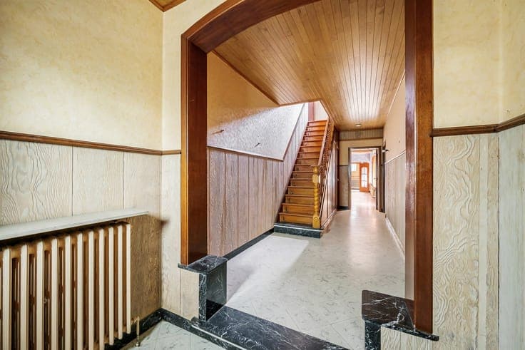 Spacious home in need of renovation with 4 bedrooms and a ga