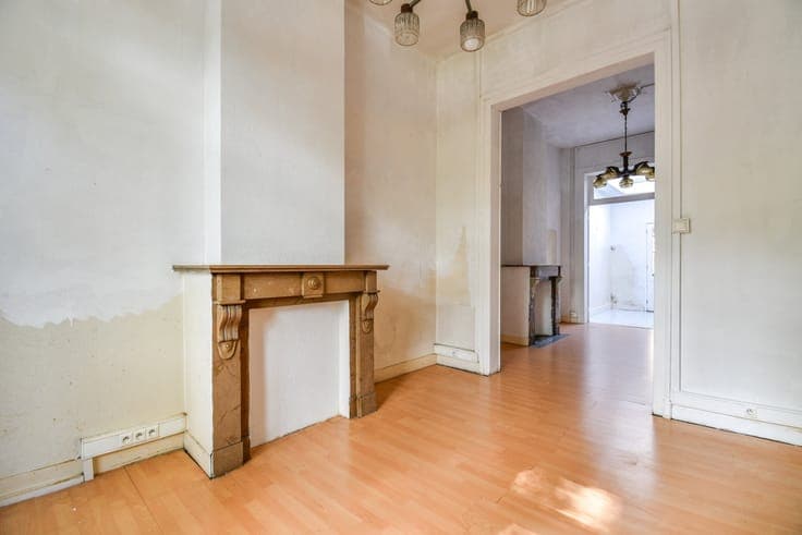 Charming townhouse in need of renovation with a city garden