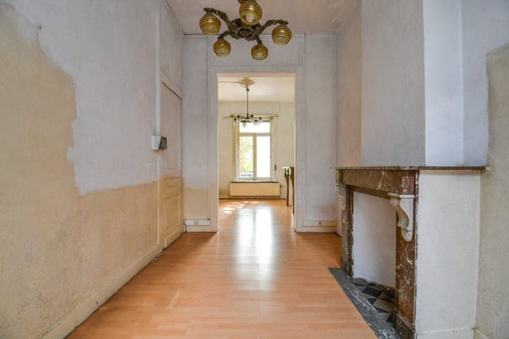Charming townhouse in need of renovation with a city garden