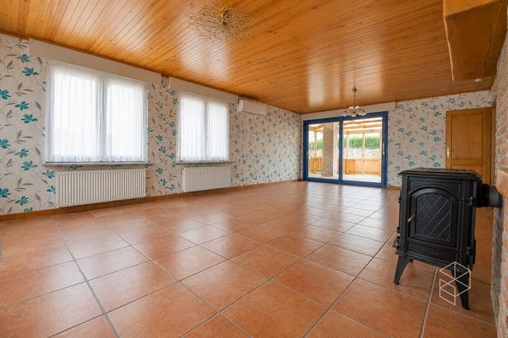 UITSTEKEND GELEGEN WONING (BJ2006) met 3 SLPK en TUIN