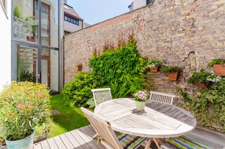 Architectenwoning met binnentuin,dakterras en garage te Gent