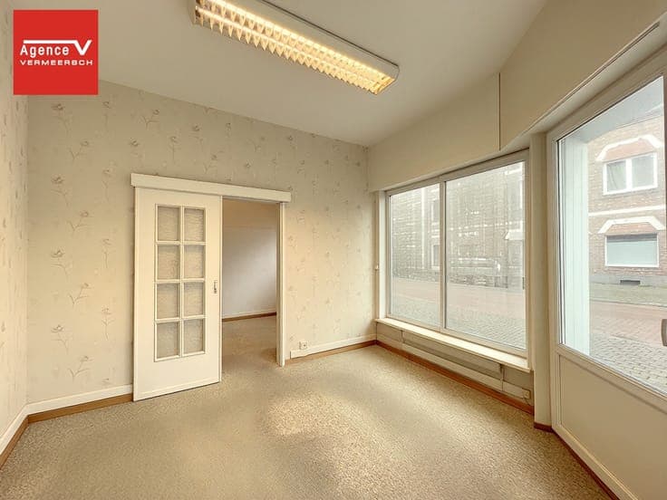 Spacious corner house with commercial space in convenient l