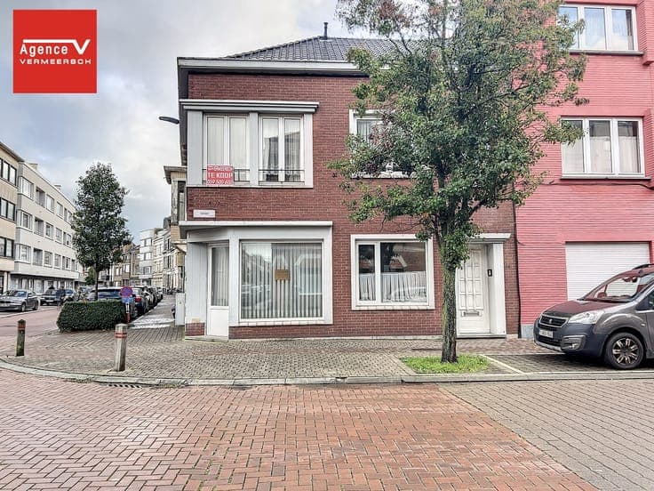 Spacious corner house with commercial space in convenient l