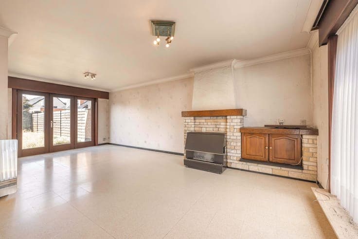 Te renoveren halfopen woning met 3 slaapkamers én zuidwes...