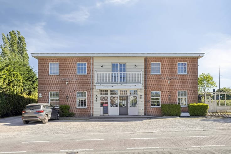 Commercial house “De Kolonie” located on the canal in Brecht